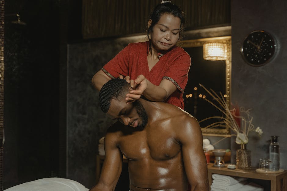 male massage therapist female client